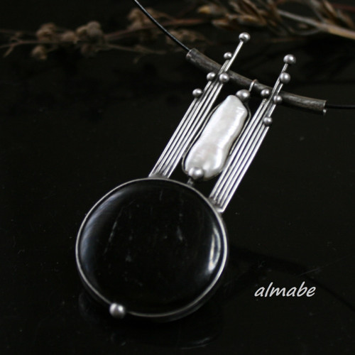 Protiklady - obsidián a perla — foto 5