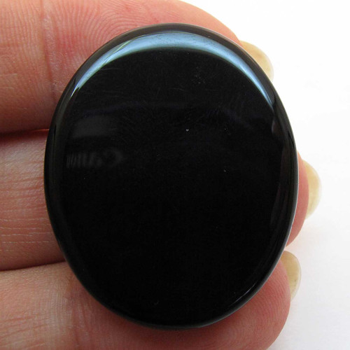 Kabošon černý onyx ovál 32mm — foto 2