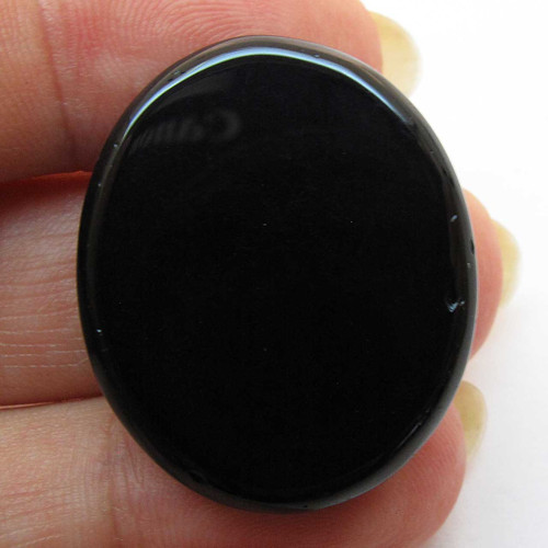 Kabošon černý onyx ovál 30mm — foto 2