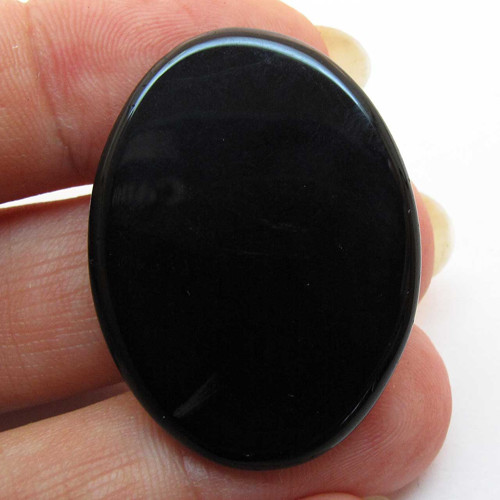 Kabošon černý onyx ovál 33mm — foto 2