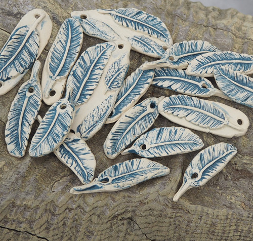 Sada keramických komponentů-pírka — foto 2