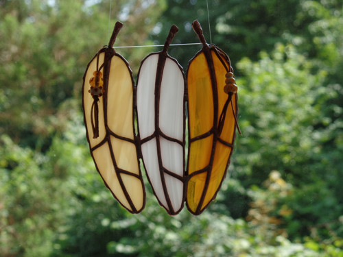 Peří z bájného ptáka Mango — foto 5
