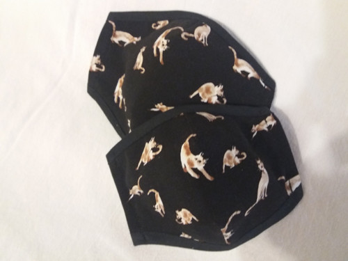Rouška kočka na černé — foto 2