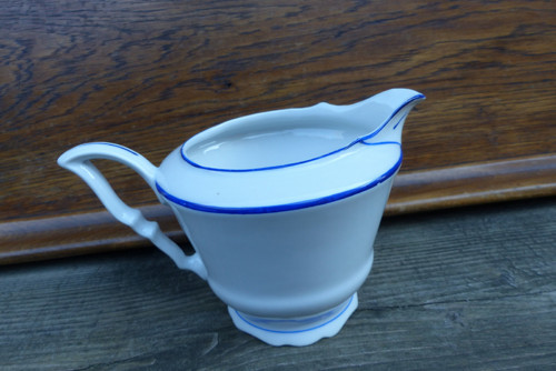 S modrou linkou...porcelánová mléčenka — foto 2