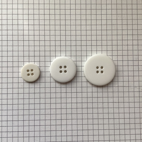 Knoflíky bílé 11 ks — foto 2