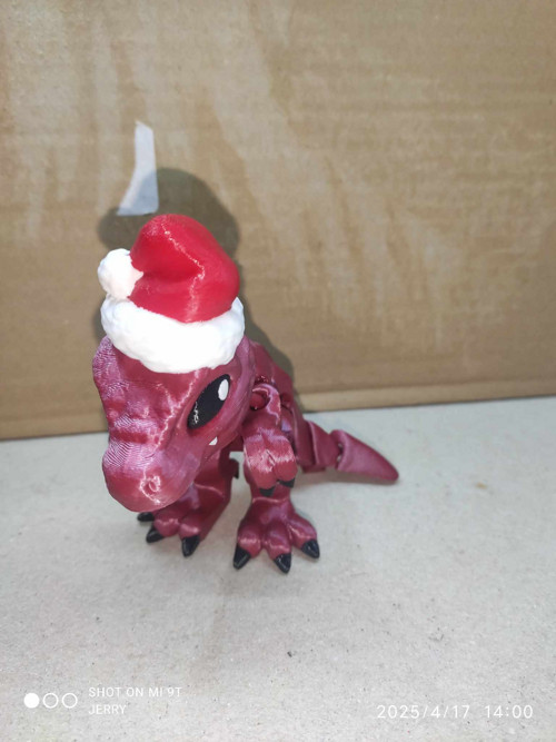 Vánoční T-Rex s čepicí — foto 2