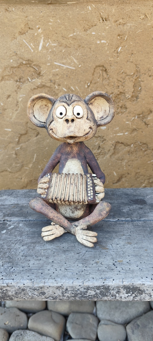 Opička harmonikářka — foto 2