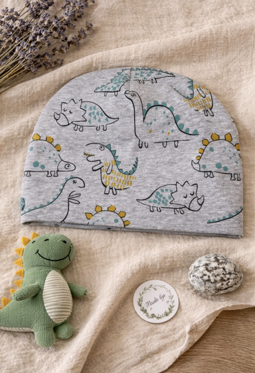 Dvouvrstvá čepice s dinosaury — foto 2
