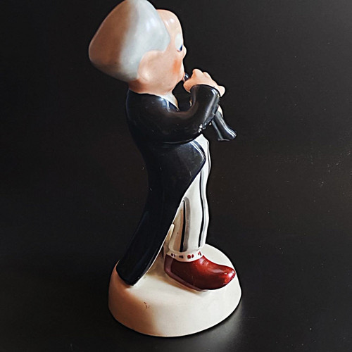 Porcelánová figurka klarinetista — foto 4