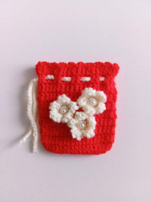 Háčkovaný pytlíček 8 x 9,5 cm — foto 4