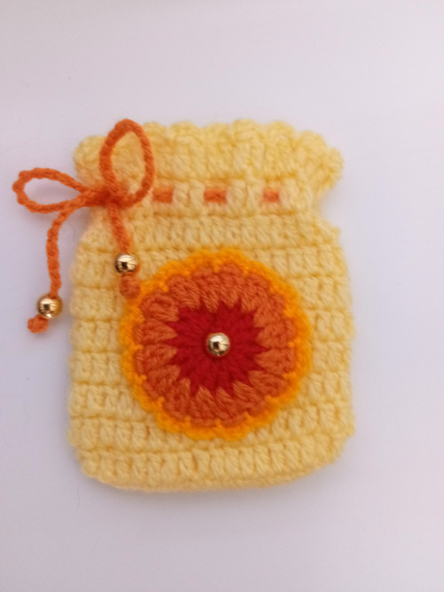 Háčkovaný pytlíček 8 x 9,5 cm — foto 4