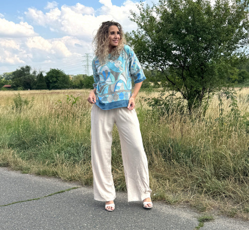 Volné kalhoty světle béžové — foto 4