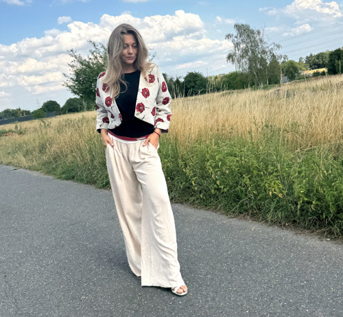 Volné kalhoty světle béžové — foto 6