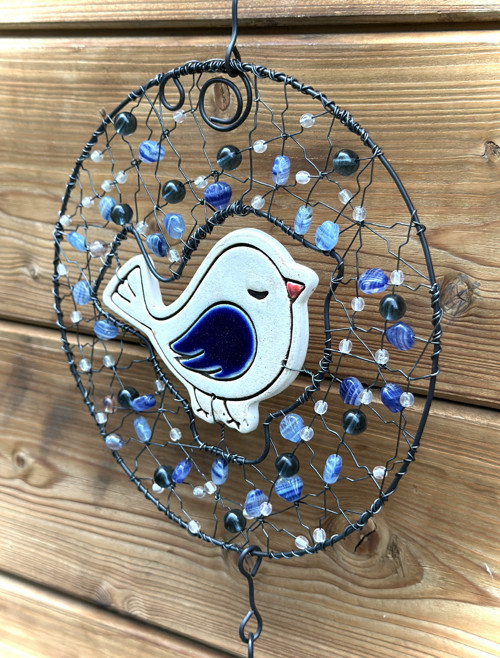 Ptáček v koruně — foto 2