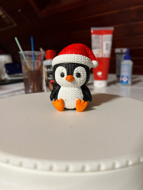 Vánoční tučňák s čepičkou — foto 2